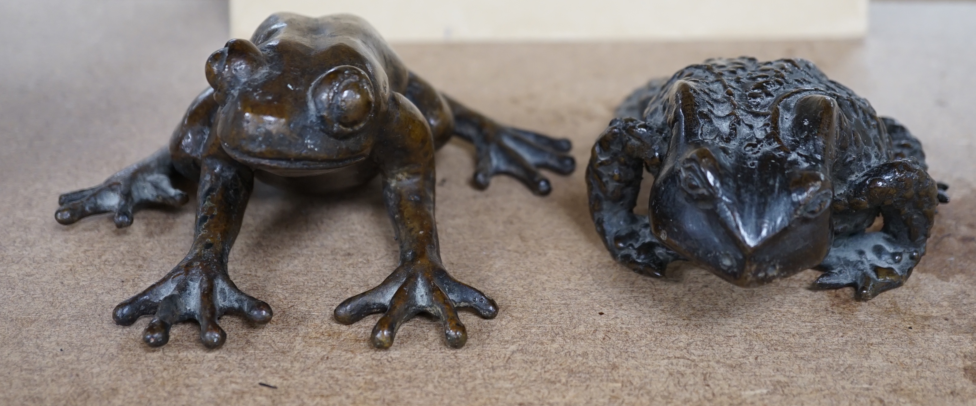 Pierre Chenet foundry (modern), a bronze model of a frog, together with an unsigned bronze model of a toad, largest 12cm. Condition - fair